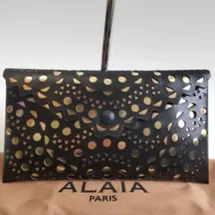 極美品 アライア カットワーク レザー クラッチ ハンドバッグ 黒 ゴールド 2026年最新】ALAiA 汚れ・破れなど：なし レディース クラッチバッグの