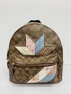 希少】コーチ リュック シグネチャー ロゴ型押し レキシー アイボリー 