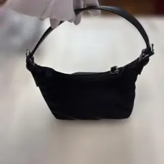 コーチの黒いナイロンハンドバッグ