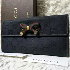 良品 GUCCI GGキャンバス シェリーライン リボン 二つ折り 長財布 黒