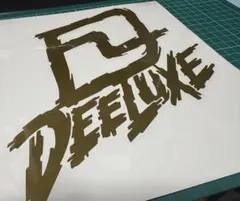 ディーラックス　ステッカー　ゴールド