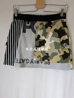 PEARLY GATES のカーキ系の迷彩と黒と白のストライプの切り替えスカート