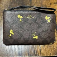 COACH リストレット　ウッドストック　peanuts ポーチのサムネイル