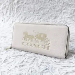 coach ラウンドファスナー　長財布　ホワイト　馬車ロゴ　レザーのサムネイル