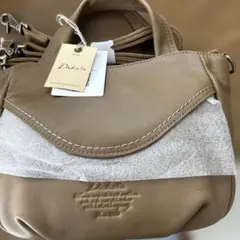 Dakota レザー ショルダーバッグ ベージュのサムネイル
