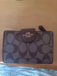 COACHの2つ折り財布