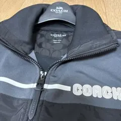 COACH　ナイロンジャケット　パーカー　総柄　カモフラ　牛革　ロゴ　美品 COACH ナイロンジャケット パーカー 総柄 カモフラ 牛革 ロゴM COACH