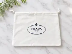 PRADA プラダ 保存袋 巾着袋 ホワイト - メルカリ