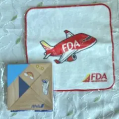 FDA 飛行機デザイン タオル & ANA 木製タングラムセット　新品未使用品のサムネイル