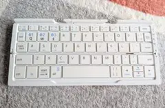 【中古美品】スマホ用　iClever 折りたたみキーボード スタンド付き ポーチのサムネイル