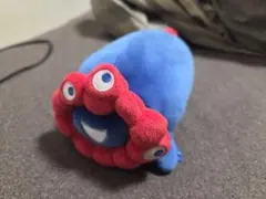 ミャクミャク ぬいぐるみ 寝そべり