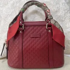 【美品】グッチ ハンドバッグ マイクロ シマレザー GGロゴ シルクネックボウ付