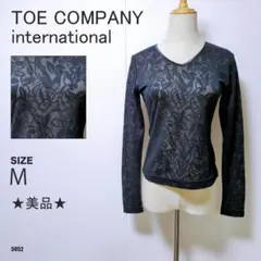 トーカンパニー レース柄 長袖トップス 黒 透け感あり フラワー模様