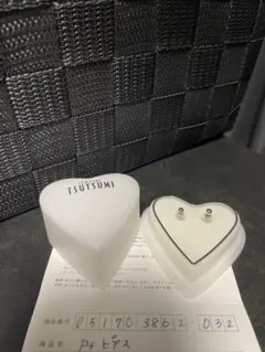 新品】ツツミ ネコ2連単 K10ピアス - メルカリ