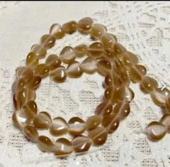 B145在庫処分！約8×8×3ミリ、小さくて可愛い、キャッツアイハートビーズ1連