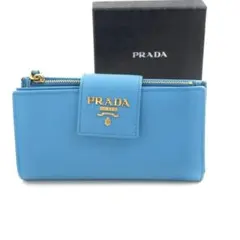 ✨新品未使用✨　PRADA ミニ財布　サフィアーノ　アイコン　ベルト　折り財布のサムネイル