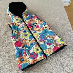 美品ロデオクラウンズワイドボールリバーシブルベスト【S】総花柄カラフル黒フリース