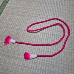 ピンク 帯締め 編み込みデザイン