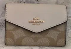 COACH C0082 二つ折りうっすらシグネチャー ホワイト系 - メルカリ