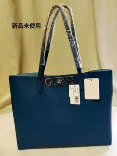 GUESS トートバッグ ブルー ゴールドロゴ - メルカリ
