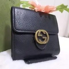 美品 GUCCI 黒レザー二つ折り財布 ゴールド金具 - メルカリ
