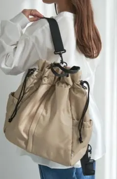 LE CERCLE par rope’　巾着型リュック/アンベロサックベージュのサムネイル