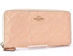 美品 COACH コーチ エンボス加工レザー 長財布 ピンクベージュ 女性 