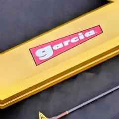 ビンテージ、未使用ガルシア スピニングロッド、金色のロッドケース入り。 ビンテージ、未使用ガルシア スピニングロッド、金色のロッドケース