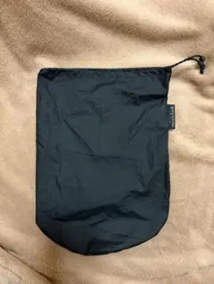 モンベル　mont-bell トラベルダウンコート収納袋　黒　21×28