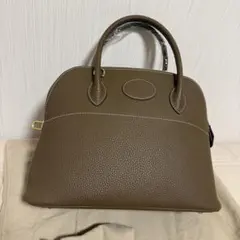 訳あり 新品 2way ハンドバッグ ショルダーバッグ 牛革　トゴ　チャーム付き