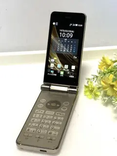 AQUOS SHF34 シャンパンゴールド　au ガラケー SIMフリー。