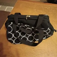 ハンドメイドバッグ。刺繍生地で作ったワイヤー口金ぽってりボストンバッグ。
