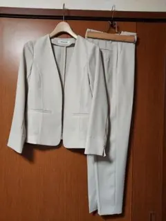 アイボリー ノーカラー ジャケット パンツセットXS　春夏