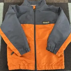オレンジとネイビーのジャケット