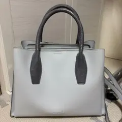 MONO COMME CA 型押しハンドバッグ