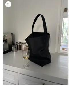 A.subjjjects Curve Leather Bucket Bag