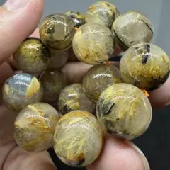 036 ゴールド タイチン ルチル クォーツ 12mm -13mm 金針 大玉 - メルカリ