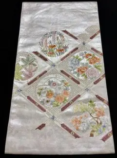美品】袋帯 明綴れ織 薄ピンク 鳳凰蝶花 お太鼓柄 シミあり - メルカリ