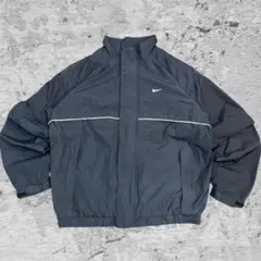 00s NIKE 中綿入り プルオーバー ナイロンジャケット 刺繍Y2K テック 00s y2k NIKE 中綿ナイロンハーフジップ サイドスプリット 刺繍