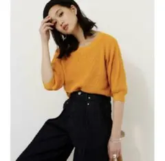 オレンジカラーのニット