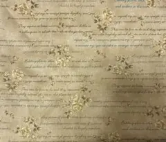 花柄と文字プリントの綿生地