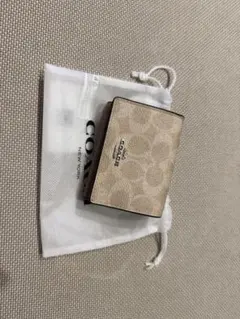 COACH 三つ折り財布 シグネチャー ベージュのサムネイル