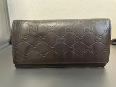 GUCCI シマ ロゴプレート 長財布 Wホック ダークブラウン - メルカリ