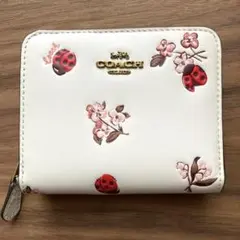 Coach 花柄 二つ折り財布 - メルカリ