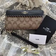 【COACH 】希少デザイン長財布 ブラウンシグネチャーブラック ラウンドジップ