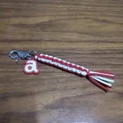 archivio 赤と白のタッセル付きティーホルダー