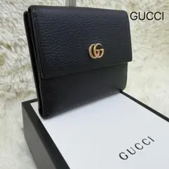 ✨美品✨ グッチ マーモントGG 二つ折り財布 金ロゴ シボ革 ブラック 箱ありのサムネイル