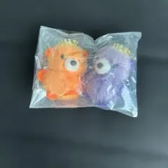 オレンジと紫のぬいぐるみキャラクター - メルカリ