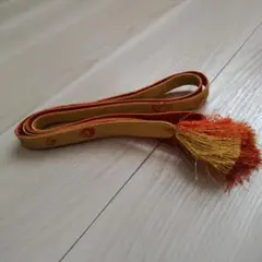 オレンジと金色の帯締め