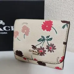 COACH 花柄 三つ折り財布 クリーム色